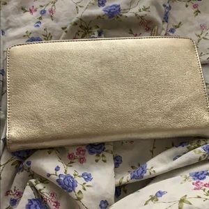 Tusk leather clutch